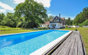 Amazing home in Borrby with Outdoor swimming pool, WiFi and Heated swimming pool in Borrby